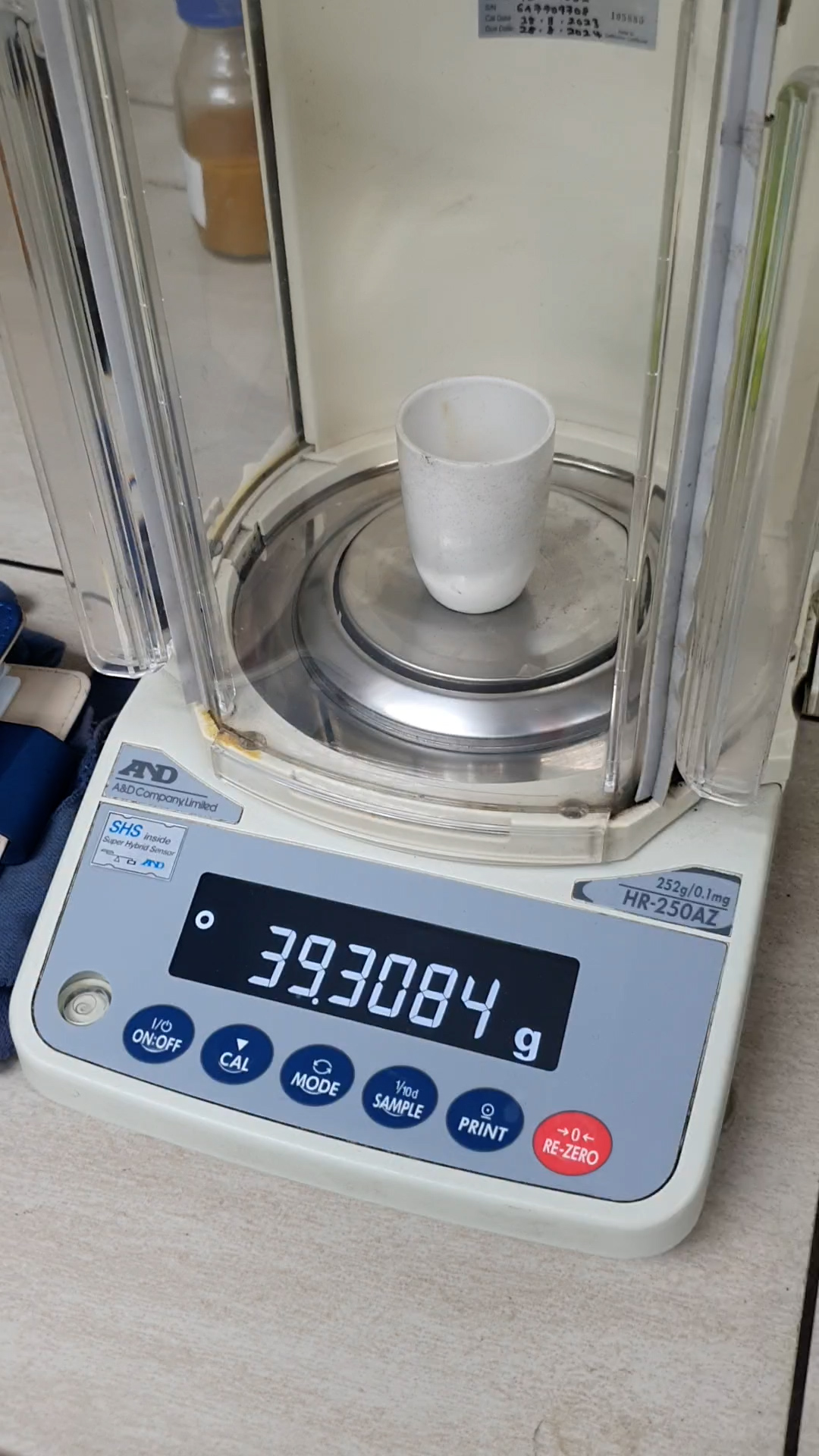 Ultra-precision balance used for weighing solids in filtration testing.